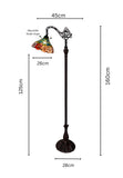A floor lamp with an adjustable stained glass shade, shown with dimension lines and measurements: 160cm height, 45cm top width, 125cm left side height, 28cm base width, and 26cm shade width.